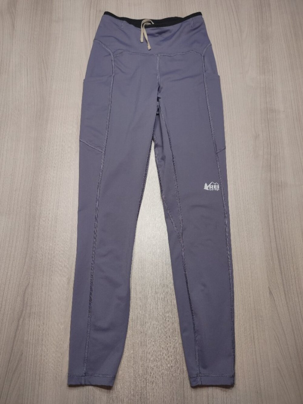 Women's REI Co-op Swiftland running tights featuring side pockets Size S